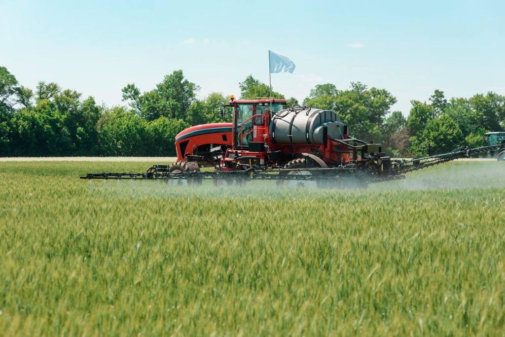 sprayer in crop of wheat